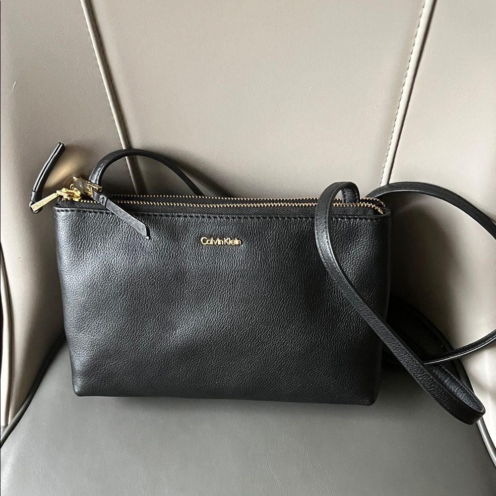 Calvin Klein Black Crossbody Bag with Gold Accents